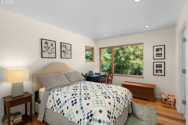 448 NW Skyline Blvd, Portland, OR 97229 - bedroom featuring wood finished floors, recessed lighting, and baseboards