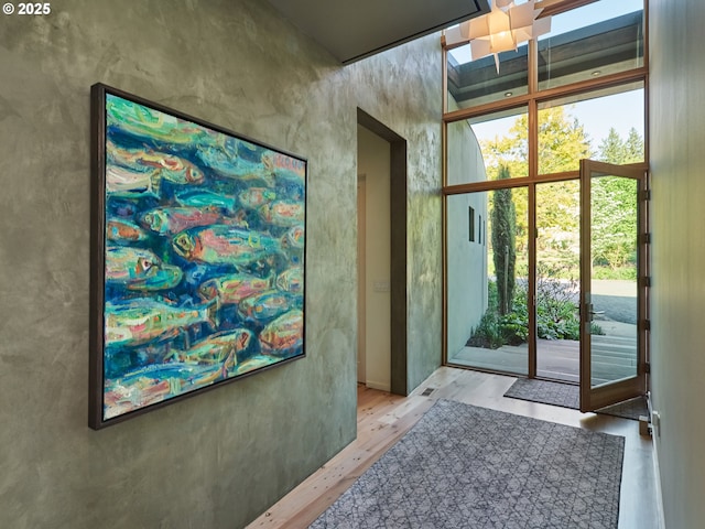 448 NW Skyline Blvd, Portland, OR 97229 - doorway featuring wood finished floors and healthy amount of natural light