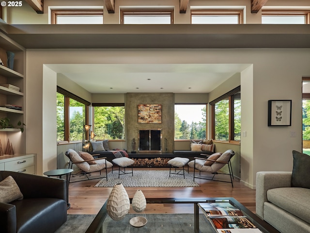 448 NW Skyline Blvd, Portland, OR 97229 - living area featuring wood finished floors, healthy amount of natural light, and a fireplace