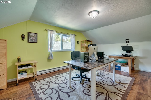 home office with a textured ceiling, a baseboard heating unit, lofted ceiling, and wood finished floors