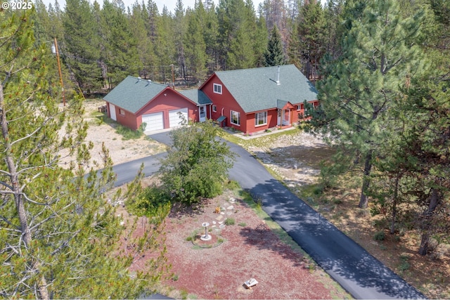 bird's eye view featuring a view of trees