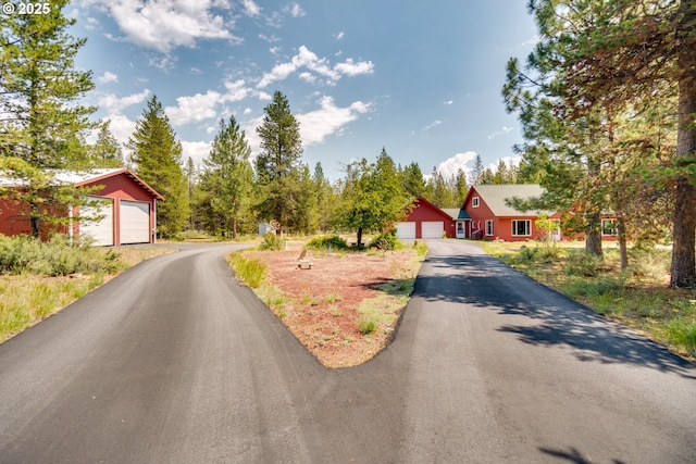 view of street with aphalt driveway