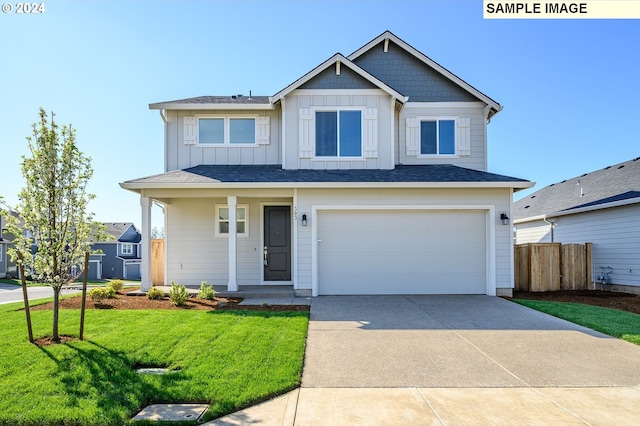 18615 NE 41st Pl Lot 288, Vancouver, WA 98686 - view of front of house featuring a front yard, a garage, board and batten siding, concrete driveway, and fence