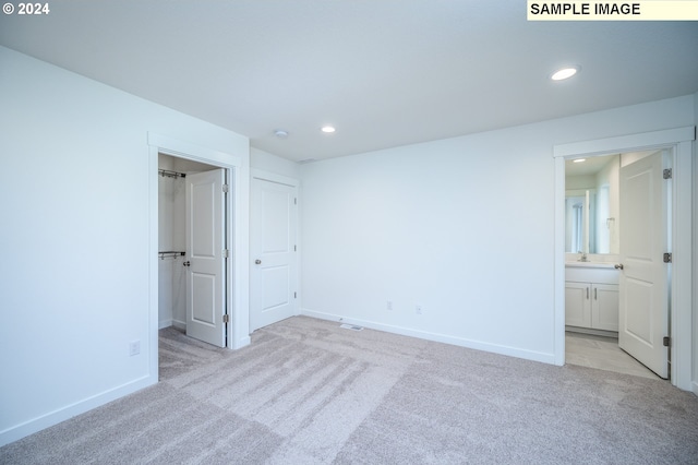 18615 NE 41st Pl Lot 288, Vancouver, WA 98686 - unfurnished bedroom featuring baseboards, recessed lighting, and light colored carpet
