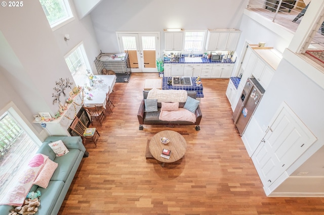 895 Pine Forest Dr, Eugene, OR 97405 - living area with a high ceiling and light wood-type flooring