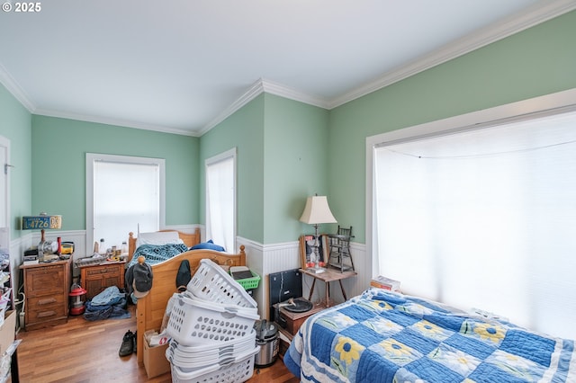 895 Pine Forest Dr, Eugene, OR 97405 - bedroom with wood finished floors, crown molding, and a wainscoted wall