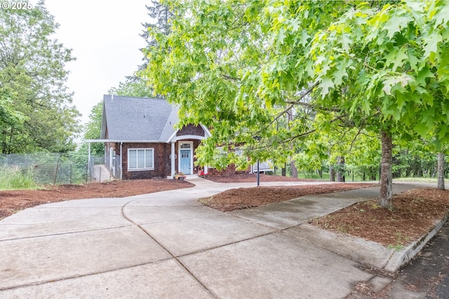 895 Pine Forest Dr, Eugene, OR 97405 - view of front of property with concrete driveway and roof with shingles