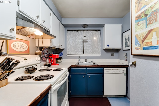 kitchen with pendant lighting, white appliances, blue cabinets, and white cabinets