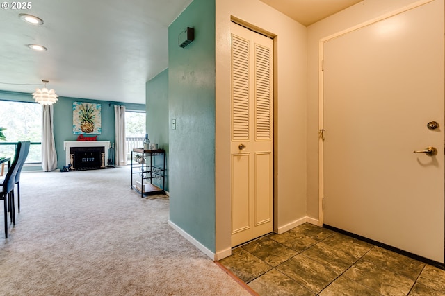 218 Trailside Loop Unit 218, Eugene, OR 97405 - entrance foyer with baseboards, recessed lighting, a fireplace, and dark colored carpet