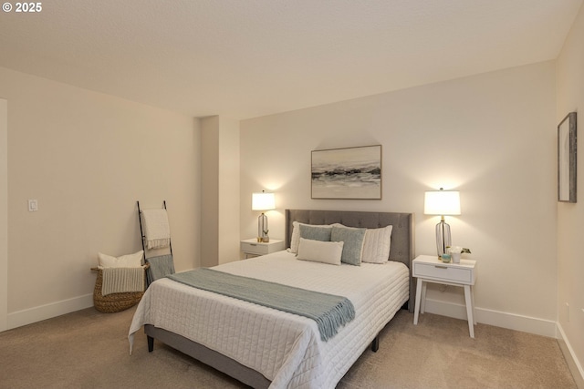 bedroom with carpet and baseboards