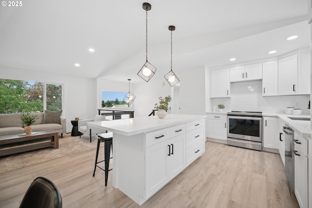 3250 SW Binford Lake Pkwy, Gresham, OR 97080 - kitchen featuring stainless steel appliances, light wood-style floors, light countertops, recessed lighting, and tasteful backsplash