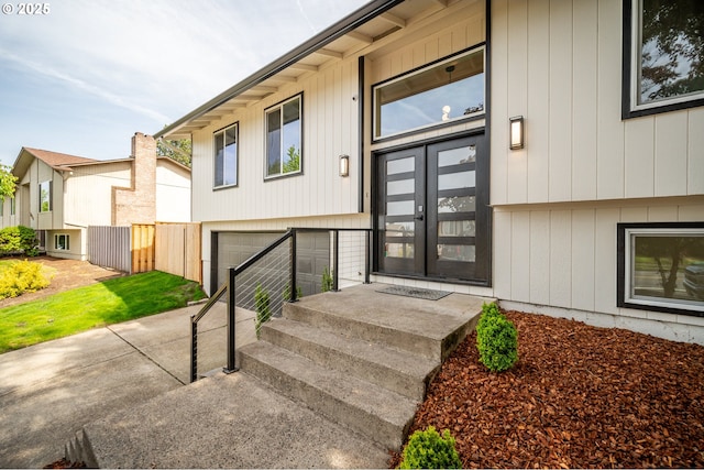 3250 SW Binford Lake Pkwy, Gresham, OR 97080 - entrance to property with concrete driveway, an attached garage, and french doors
