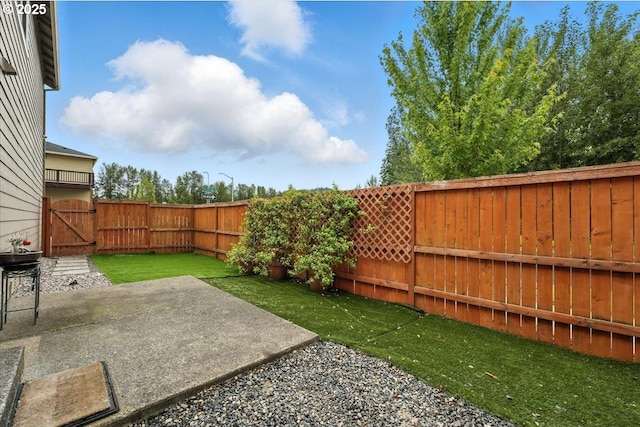 2103 SE 18th Aly, Gresham, OR 97080 - fenced backyard with a patio area and a gate