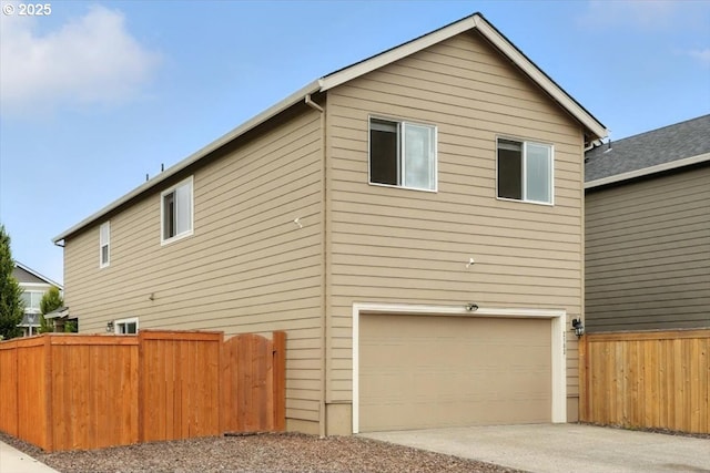2103 SE 18th Aly, Gresham, OR 97080 - view of home's exterior featuring a garage and concrete driveway