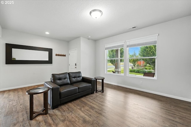 2103 SE 18th Aly, Gresham, OR 97080 - living area featuring wood finished floors and recessed lighting