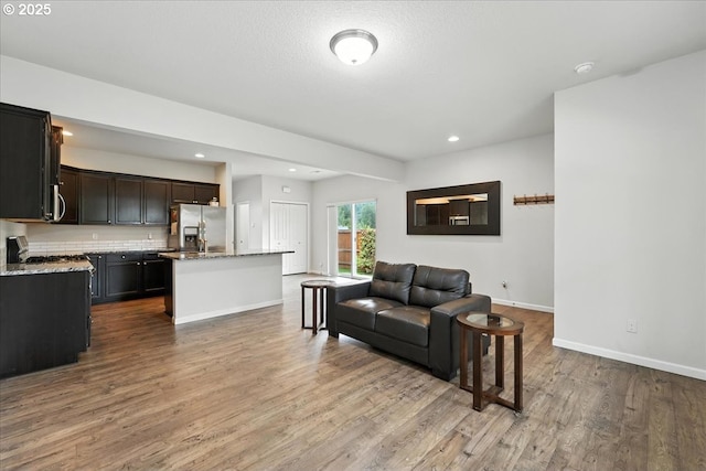 2103 SE 18th Aly, Gresham, OR 97080 - living room with wood finished floors and recessed lighting