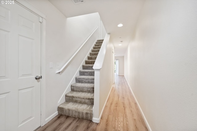 7612 NE 34th Ave Unit A8, Vancouver, WA 98665 - unfurnished bedroom featuring connected bathroom, a spacious closet, baseboards, light colored carpet, and lofted ceiling