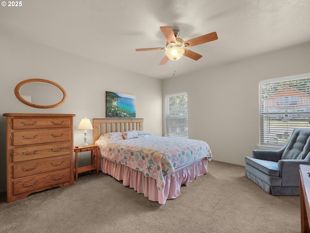 90637 Lewis Rd, Warrenton, OR 97146 - bedroom with light carpet and a ceiling fan