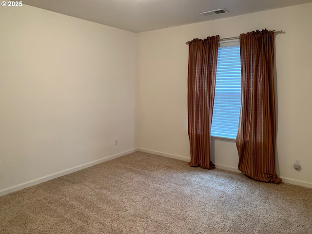 view of carpeted spare room