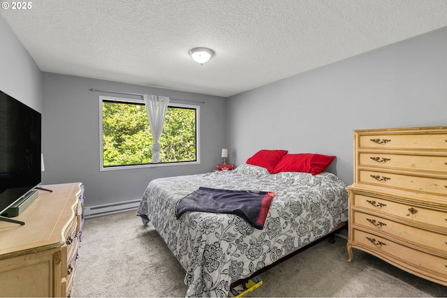 bedroom featuring dark carpet, a textured ceiling, and baseboard heating