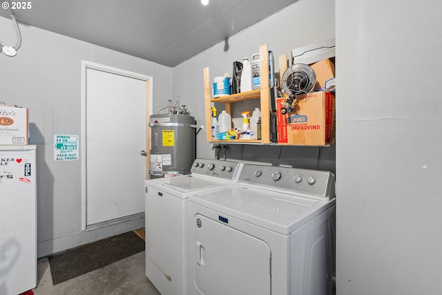 washroom with separate washer and dryer and secured water heater