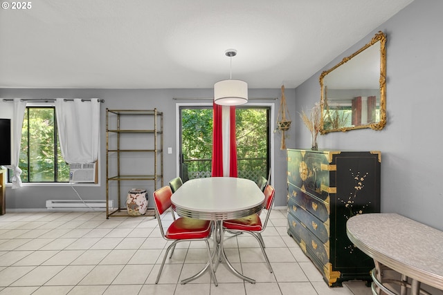 dining area featuring light tile patterned flooring, cooling unit, and a baseboard heating unit