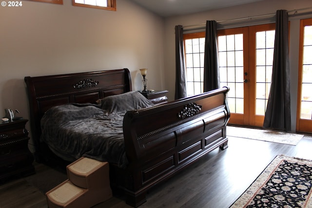 bedroom featuring wood finished floors and french doors