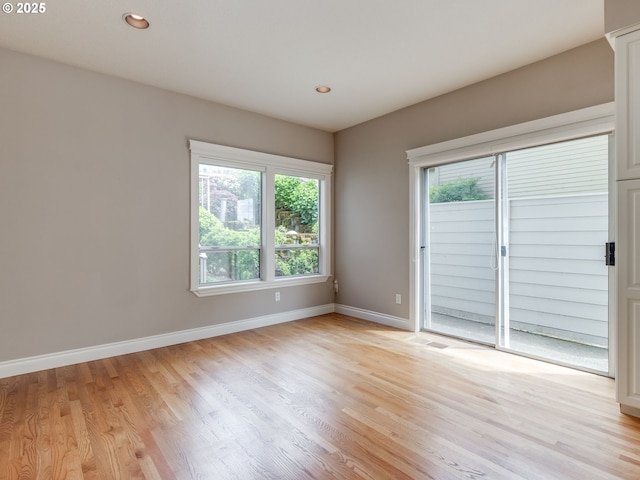 6903 SE Riverside Dr Unit 20, Vancouver, WA 98664 - spare room with baseboards, light wood-type flooring, and recessed lighting
