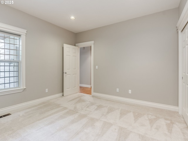 6903 SE Riverside Dr Unit 20, Vancouver, WA 98664 - unfurnished bedroom featuring light colored carpet, baseboards, multiple windows, and recessed lighting
