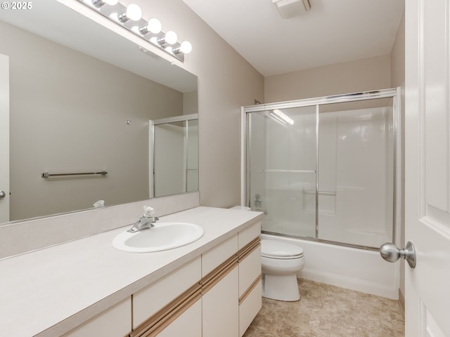 6903 SE Riverside Dr Unit 20, Vancouver, WA 98664 - bathroom featuring vanity, toilet, and enclosed tub / shower combo