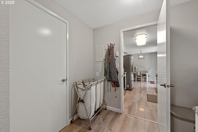 1220 Baker St, Baker City, OR 97814 - hallway featuring light wood-type flooring and baseboards
