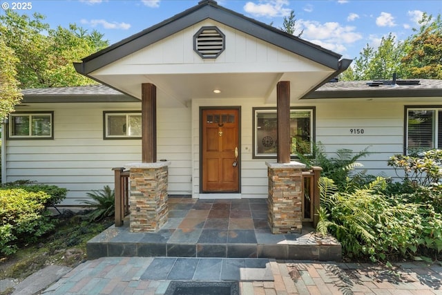9150 SW Salmon St, Portland, OR 97225 - entrance to property featuring covered porch and a shingled roof