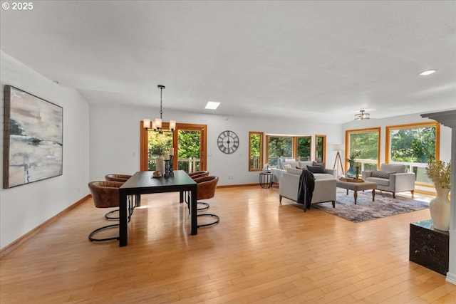 9150 SW Salmon St, Portland, OR 97225 - dining area with a chandelier, light wood-style floors, plenty of natural light, and recessed lighting