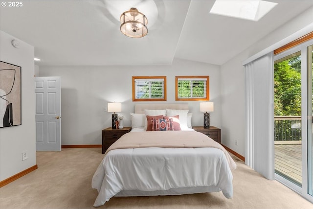 9150 SW Salmon St, Portland, OR 97225 - bedroom featuring light colored carpet, access to outside, lofted ceiling, and a skylight