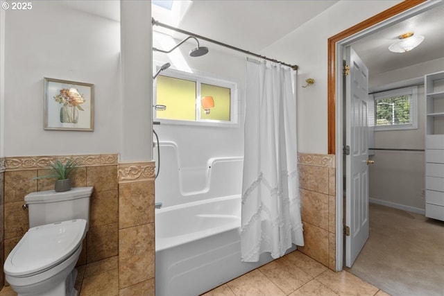 9150 SW Salmon St, Portland, OR 97225 - bathroom featuring tile walls, wainscoting, tile patterned flooring, and shower / tub combo with curtain