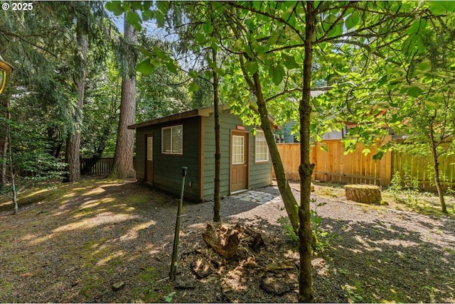 9150 SW Salmon St, Portland, OR 97225 - view of side of home with a fenced backyard and an outdoor structure