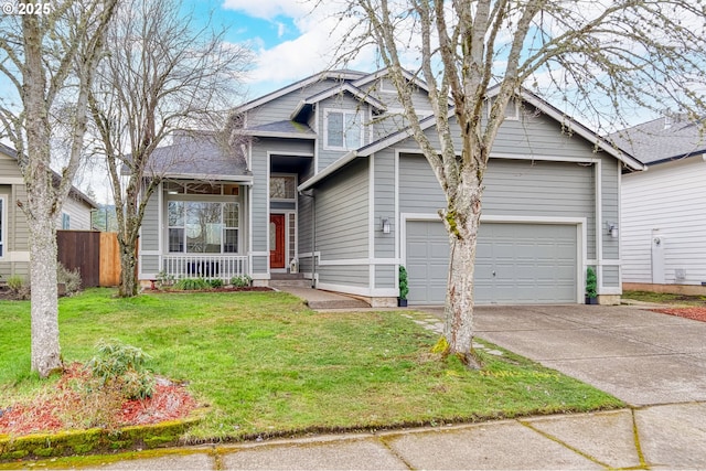 view of front facade with a garage and a front yard