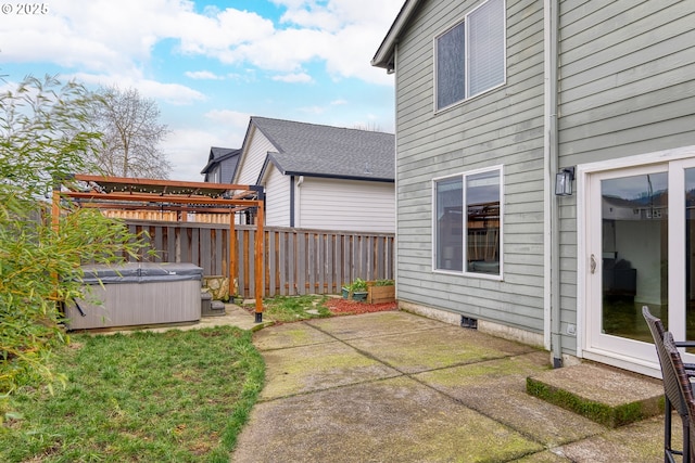 view of patio with a hot tub