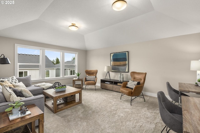 17641 NW Layla Dr, Portland, OR 97229 - carpeted living area with lofted ceiling and baseboards
