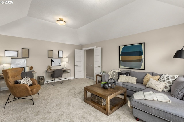 17641 NW Layla Dr, Portland, OR 97229 - living room featuring carpet, a desk, lofted ceiling, and baseboards