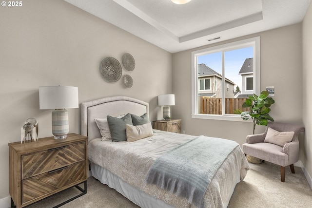 17641 NW Layla Dr, Portland, OR 97229 - bedroom featuring carpet floors, baseboards, and a raised ceiling