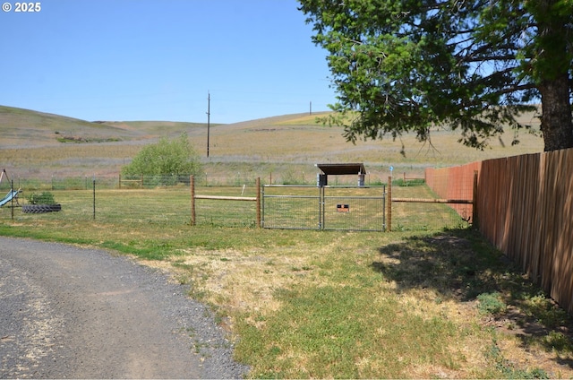 46083 Adams Rd, Pendleton, OR 97801 - view of yard featuring a gate, a view of rural / pastoral area, and a mountain view