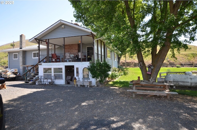 46083 Adams Rd, Pendleton, OR 97801 - back of property featuring stairway, a chimney, and oil tank