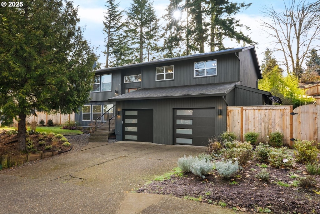 view of front of property with a garage