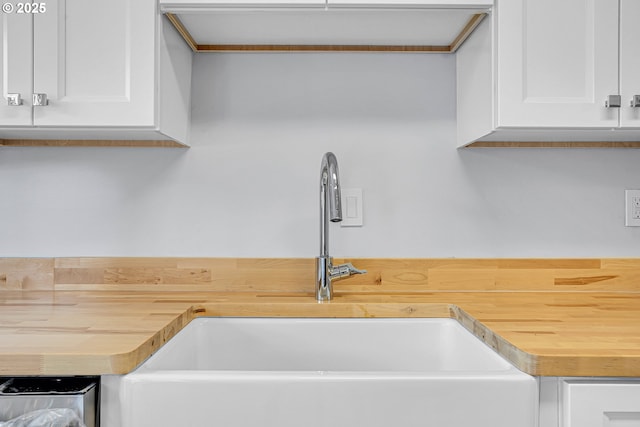 6255 SW Mad Hatter Ln, Beaverton, OR 97008 - kitchen view of wooden counters and white cabinets