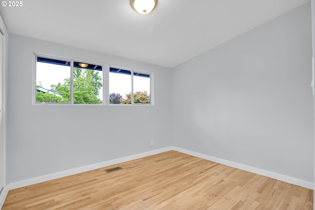 6255 SW Mad Hatter Ln, Beaverton, OR 97008 - spare room featuring baseboards and wood finished floors