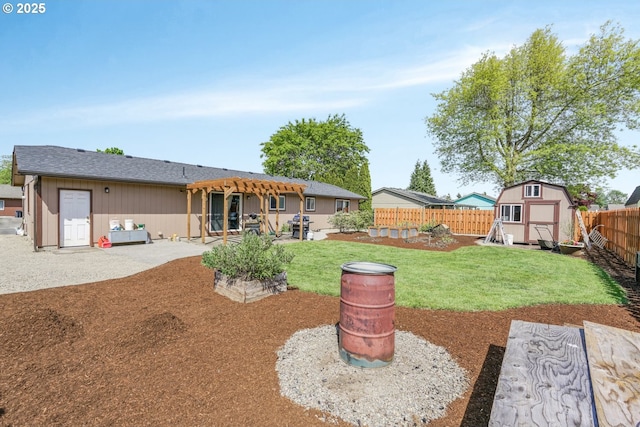 view of yard with an outdoor structure, a pergola, a fenced backyard, a patio area, and a storage shed