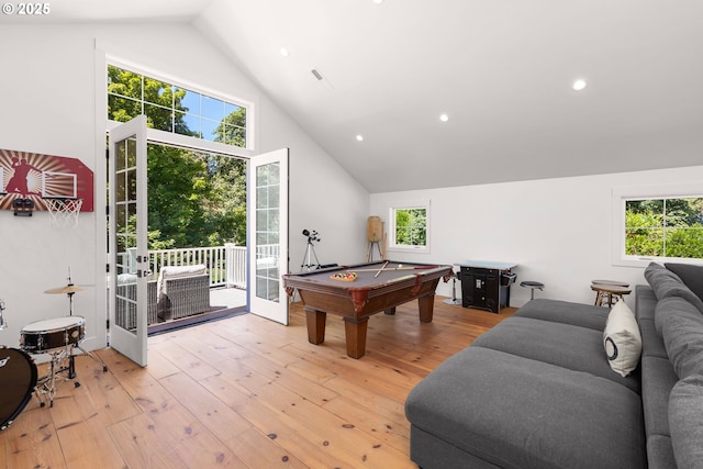 playroom featuring a healthy amount of sunlight, billiards, light hardwood / wood-style floors, and french doors