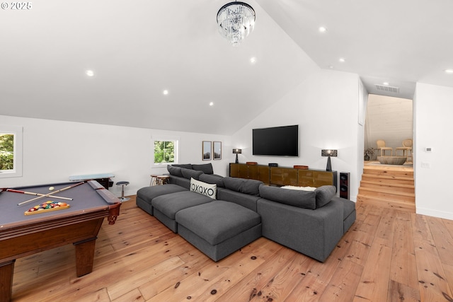 living room featuring light hardwood / wood-style flooring, billiards, and vaulted ceiling