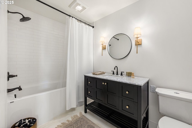 full bathroom with vanity, toilet, and shower / tub combo